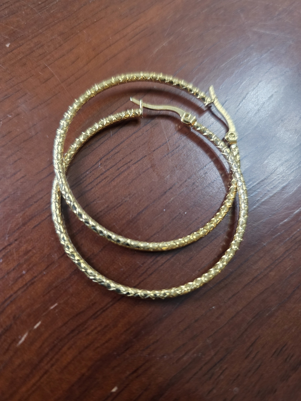 -Round, textured hoop earrings.Gold Plated .Very lightweight. Women Jewelry